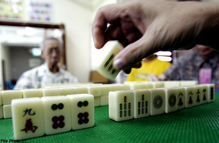 Learning to Play Mahjong